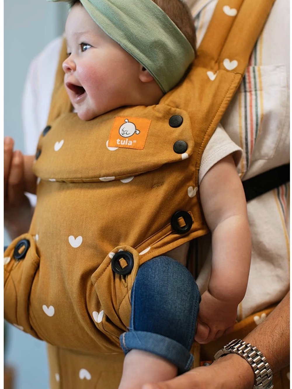 Tula Mustard Baby item with White Heart Print